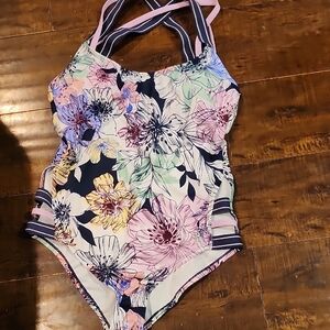 One Piece Pink and Blue Swimsuit with Artistic Floral Design